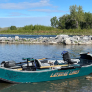 Drift boat fly fishing in southern Alberta.